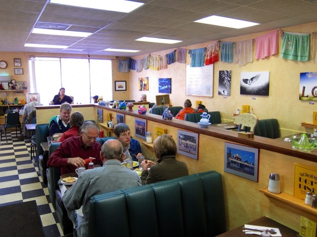 Check out the aprons on the wall at Dot's Diner in Boulder