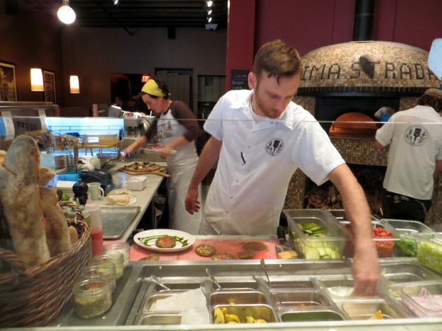 Getting the pizzas ready for the 850 F. oven at Pizzeria Prima Strada