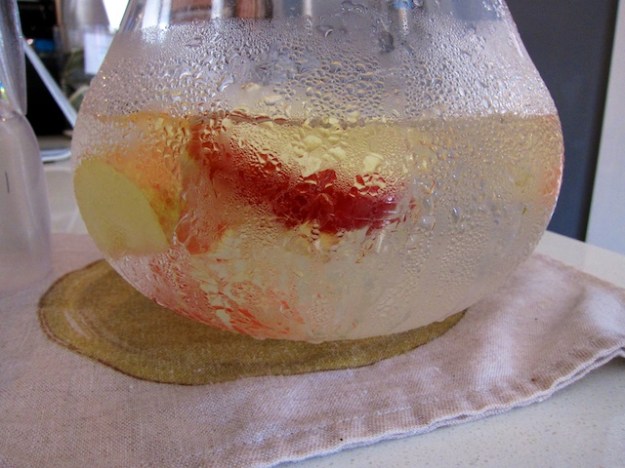 Moore covers all the nice touches like this jug of fruit-infused water