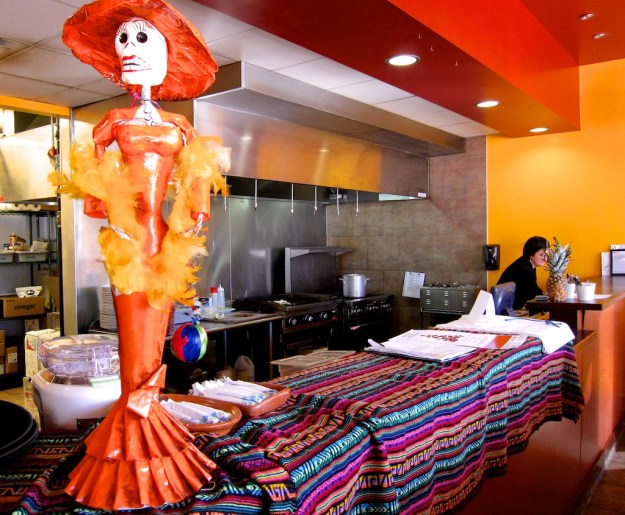 Fantastic papier-mache figurines lend an authentic Mexican touch to Las Maracas