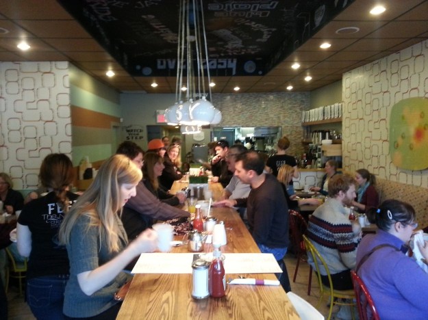 You'll definitely be rubbing shoulders with other diners at Calgary breakfast hotspot OEB