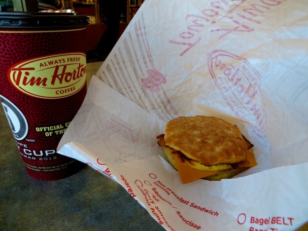 Coffee and a breakfast sausage at Tim Horton's