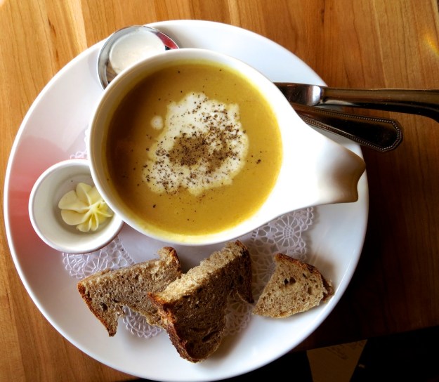 Beautifully presented and executed pumpkin soup with local sourdough bread at Bistro Provence