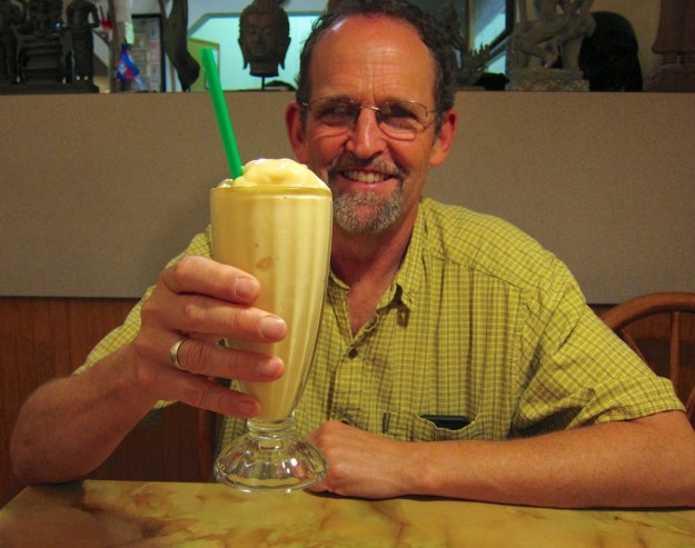 Bottoms up! Charlie about to embrace a "stinky" Durian shake at Phnom Penh in Seattle