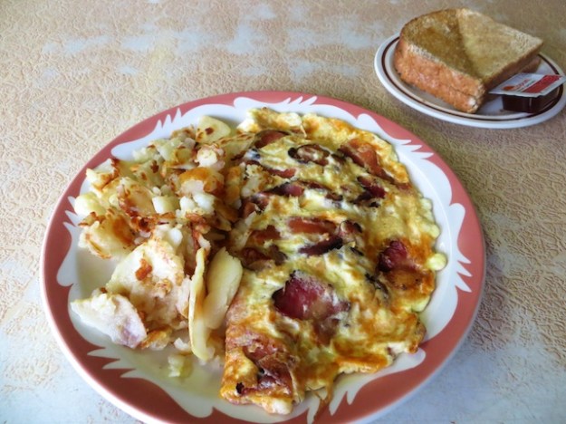 My $6 omelette, with a side of "brown" toast, goes down nicely