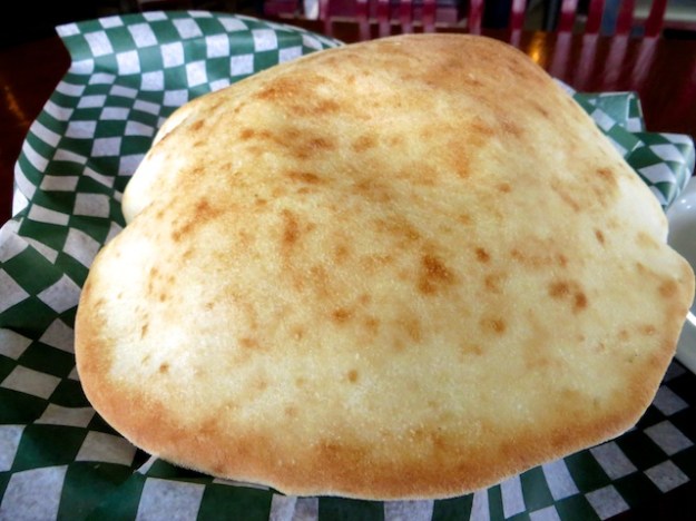 This warm, puffed pita is so good, you can eat it on its own