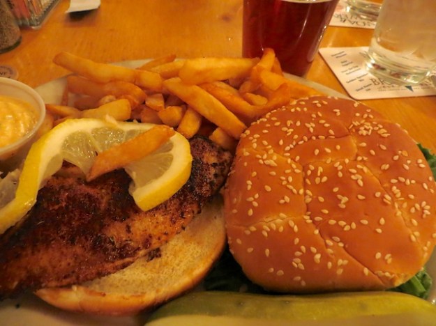 A tilapia sandwich, fries and pint adds up to only $13 at the busy Moab Brewery