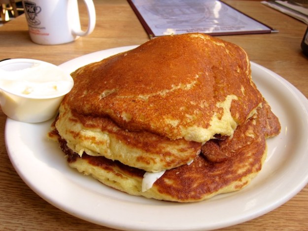 They're rightly called "Heavenly Hotcakes" at Penny Ann's Cafe. These have bacon and eggs in the middle