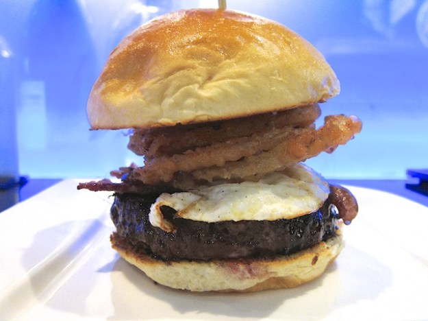 Bachi Burger's glorious wagyu patty, loaded with onion rings and an egg