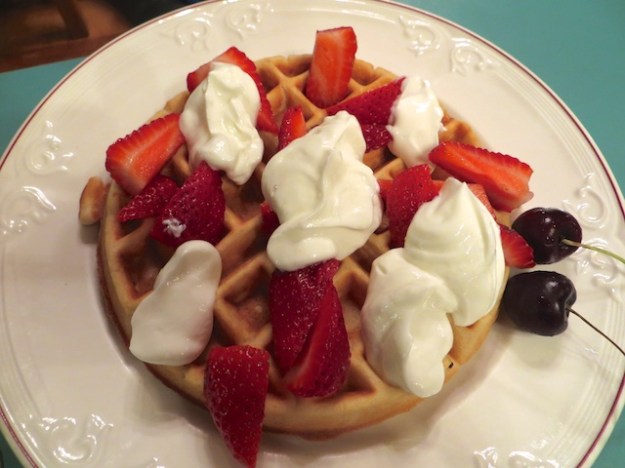 Waffles with strawberries and cream
